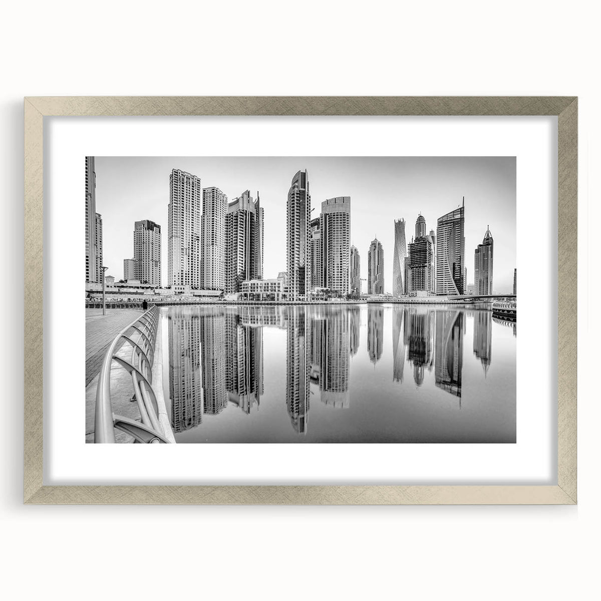 Textured abstract art print of Dubai skyline in muted earth tones, framed in silver, ideal for bedroom art.