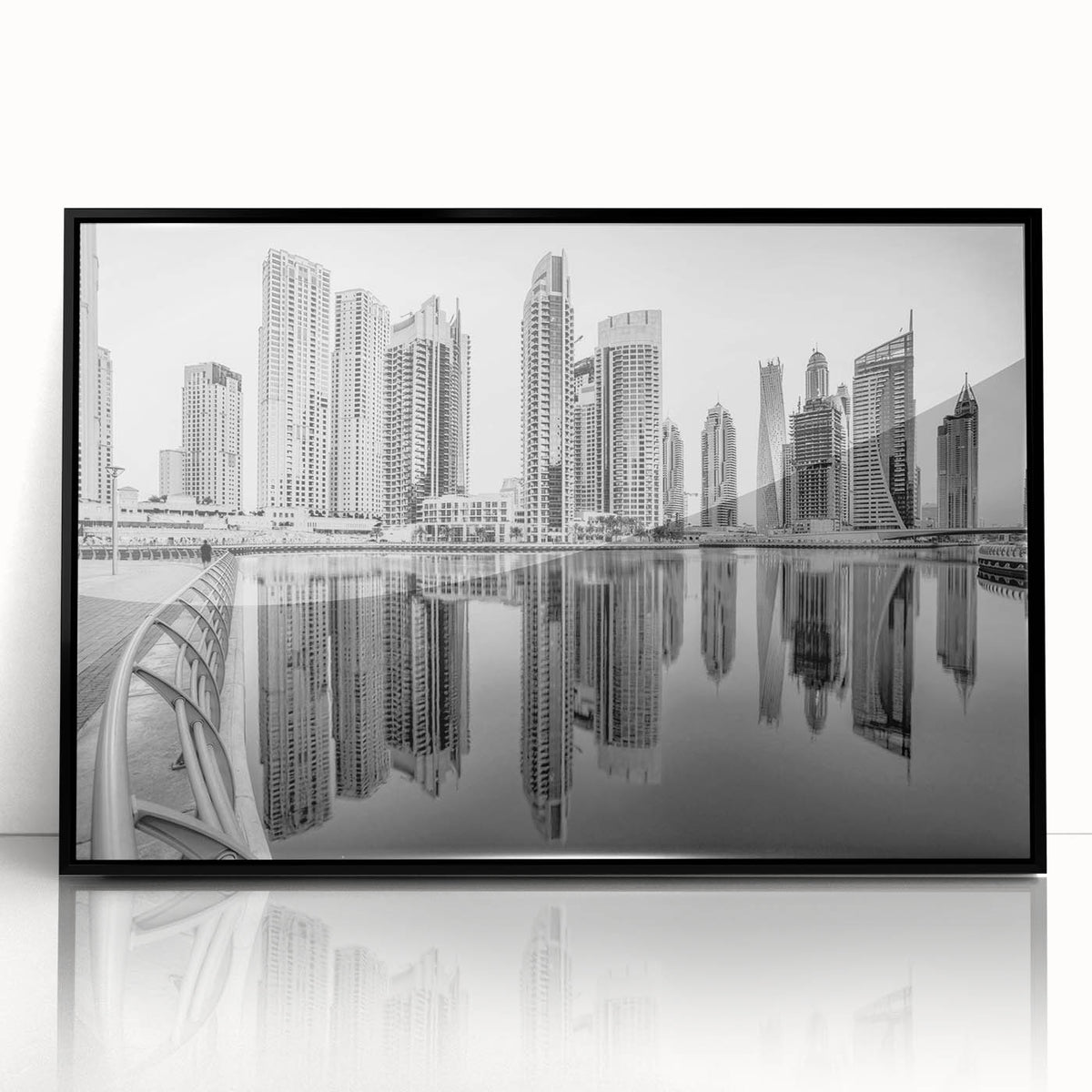 Large abstract wall art depicting the Dubai skyline in muted gray and blue tones on a framed acrylic.