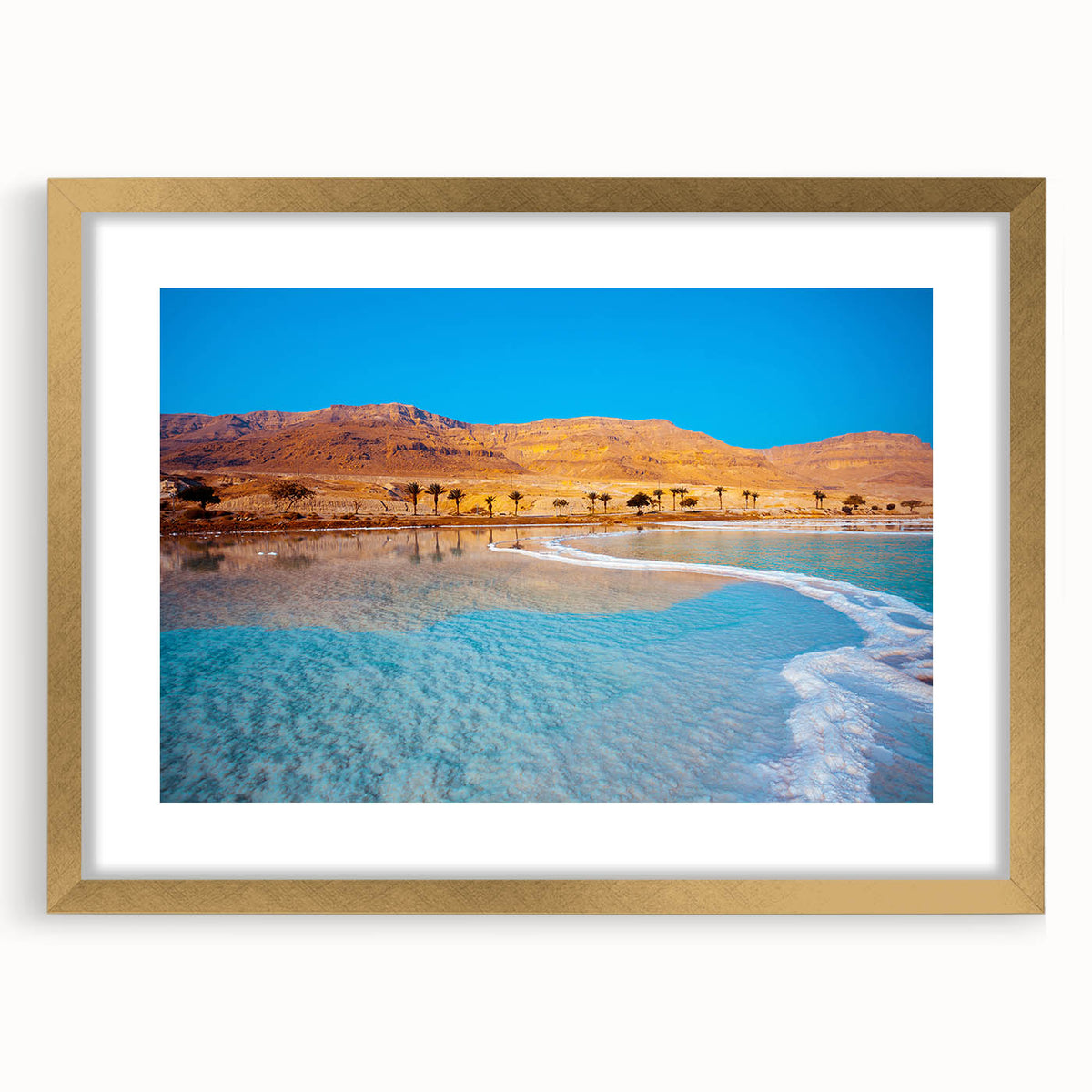 Extra large abstract art print of the Dead Sea in muted blue and beige tones, framed in gold, ideal for living room decor.