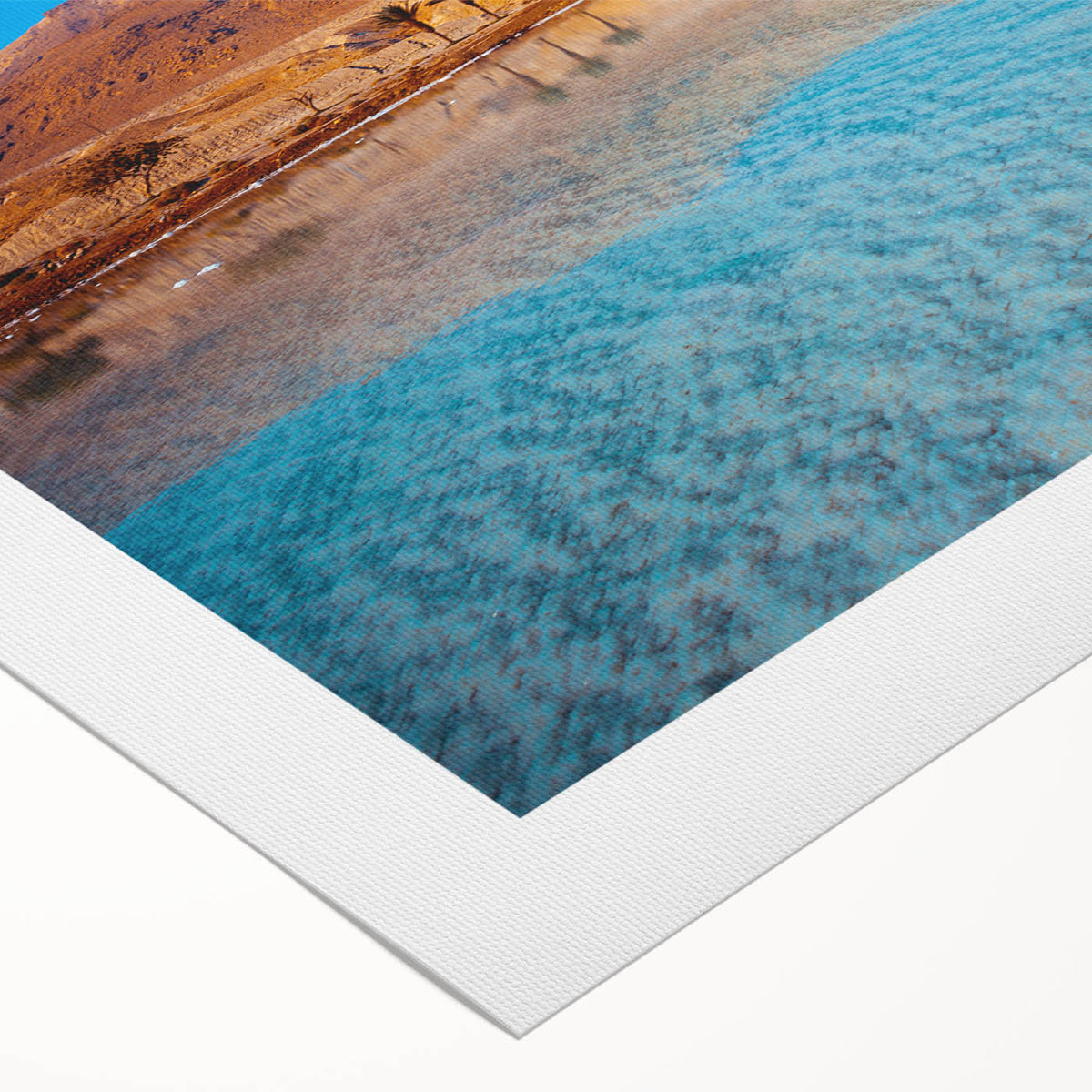 Art deco poster of the Dead Sea in muted blue and beige tones on rolled canvas, suitable for dining room wall art.