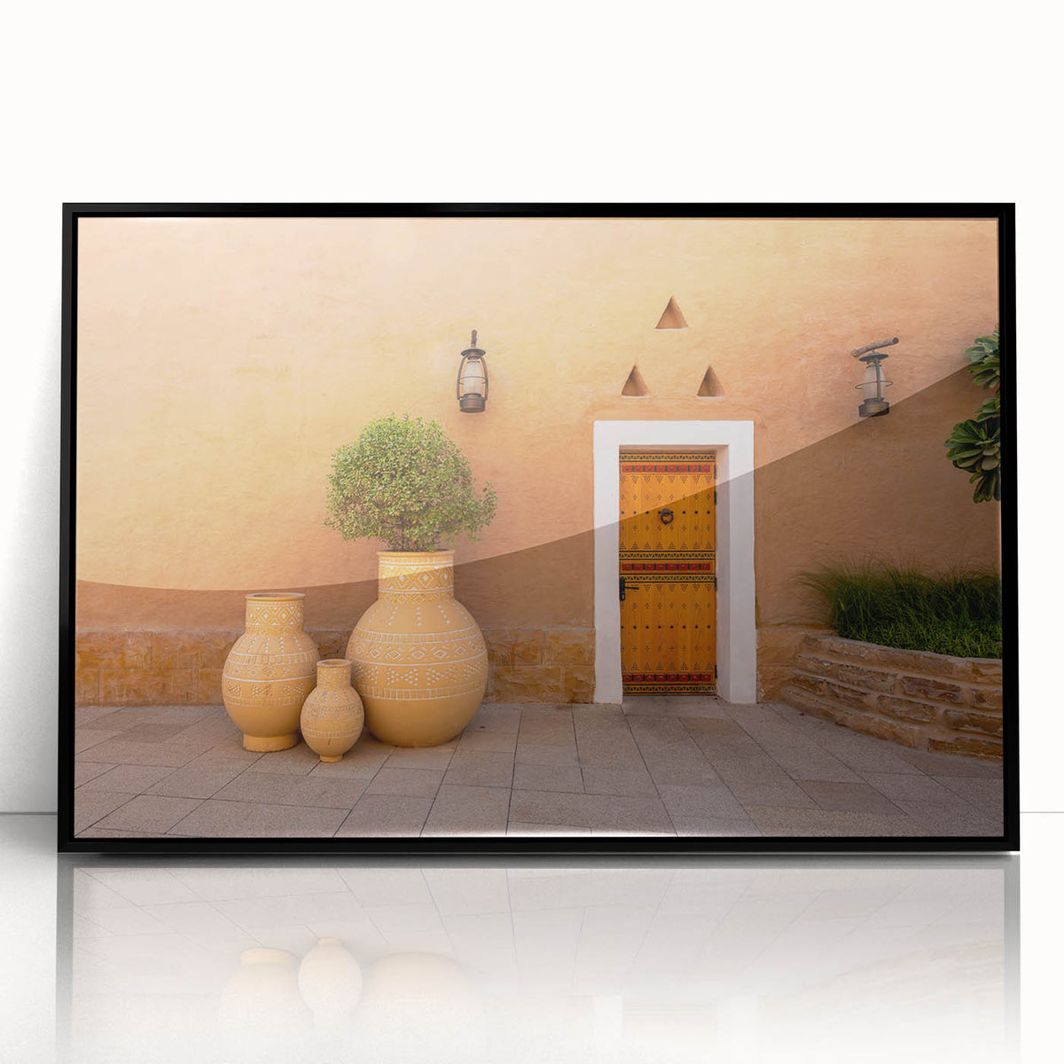 Large abstract wall art depicting a Middle Eastern desert scene in muted earth tones on a framed acrylic.