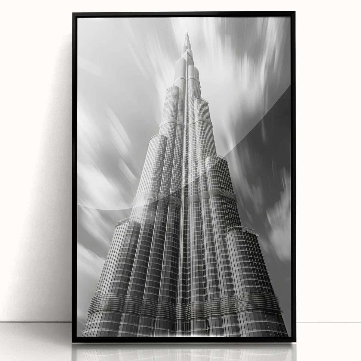 Large abstract wall art of the Burj Khalifa in muted gray tones, acrylic print in a black frame.