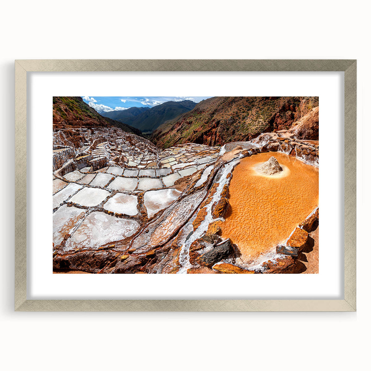 Textured art depicting an abstract Peruvian landscape in earthy tones on a framed silver mat, suitable for bedroom decor.