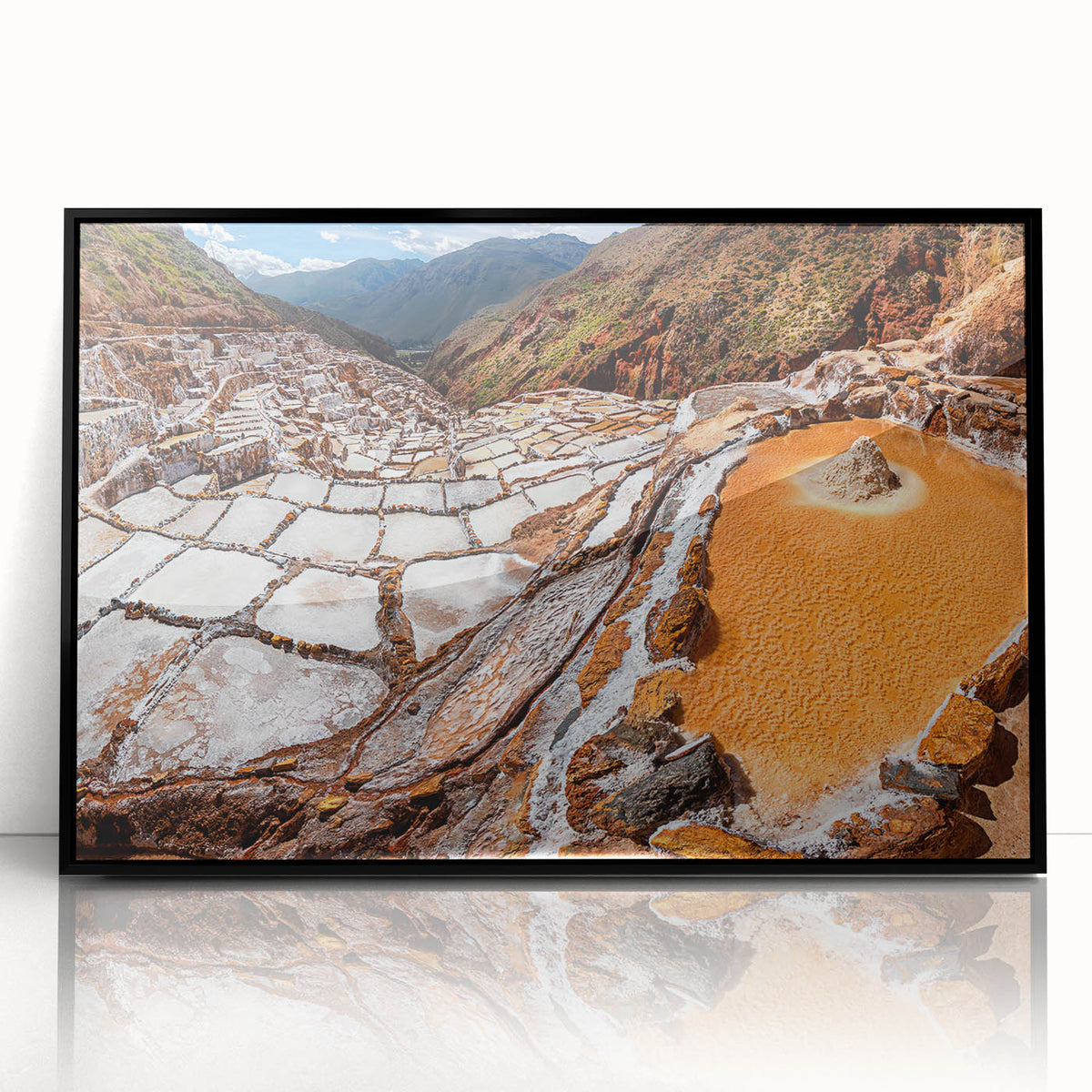 Large abstract wall art depicting a stylized Peruvian landscape in muted earth tones, framed in black acrylic.