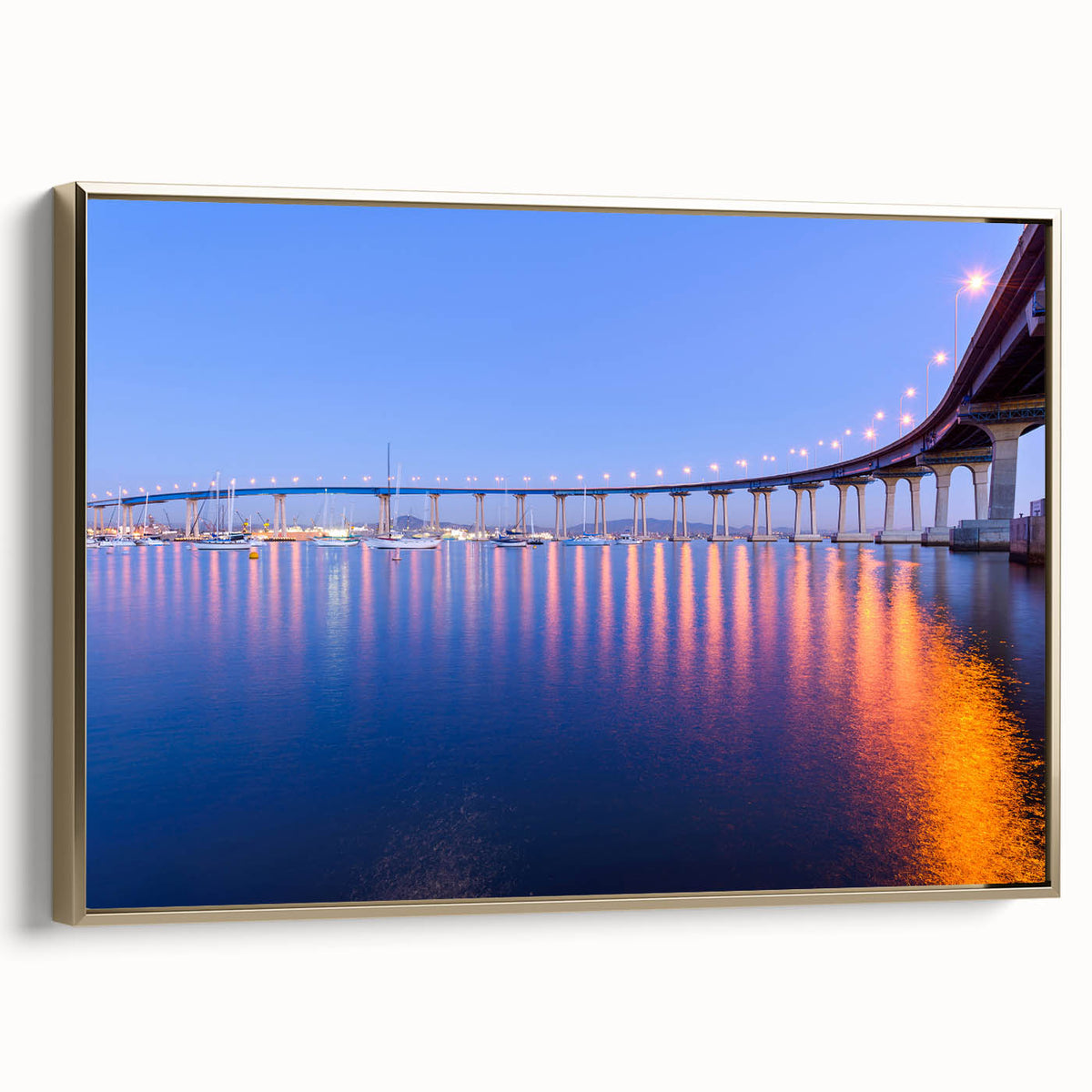 Framed canvas of vintage-style Coronado, California landscape in black and gold tones, ideal for bedroom wall art.