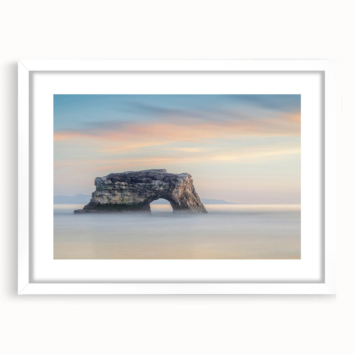 Abstract art print of Santa Cruz with muted blue and gray tones on a framed white mat, ideal for dining room decor.
