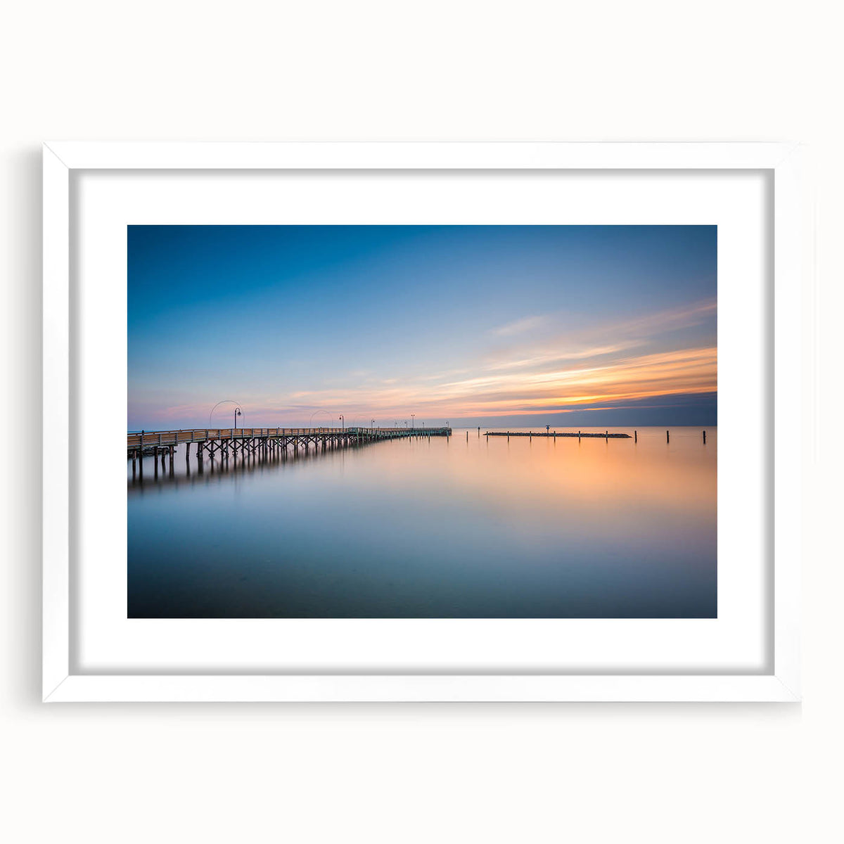 Abstract art print of Chesapeake Bay in muted blue and gray tones on a white framed mat, suitable for dining room decor.