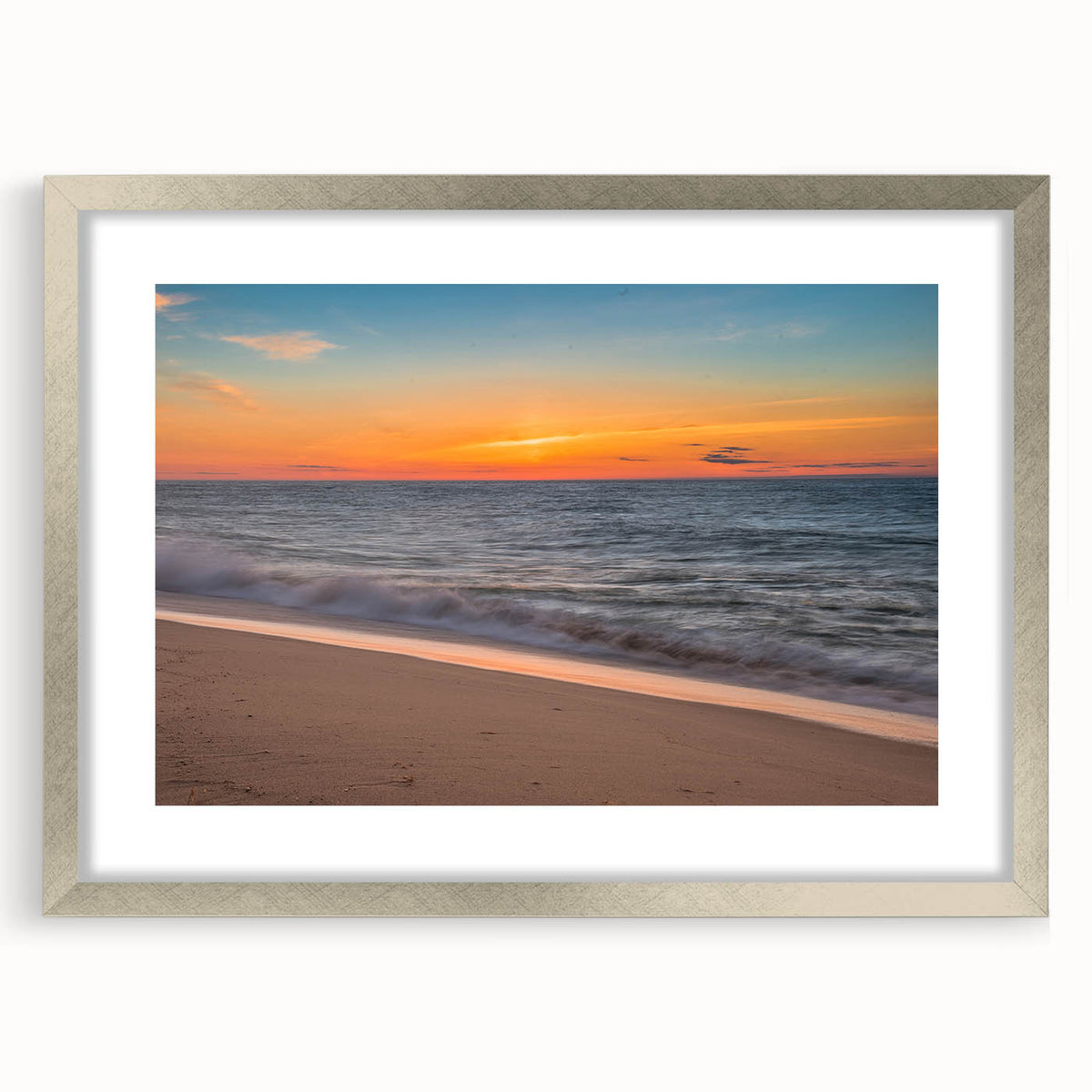 Textured abstract art print of Nantucket scenery in muted blue and gray tones, framed in silver, ideal for bedroom art.