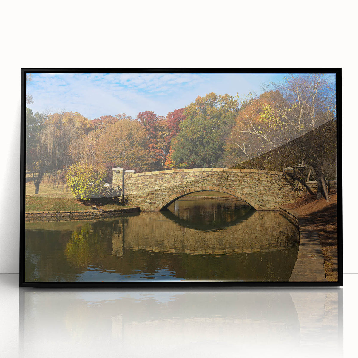 Large abstract wall art of Charlotte skyline in muted gray and blue tones, acrylic print framed in black.