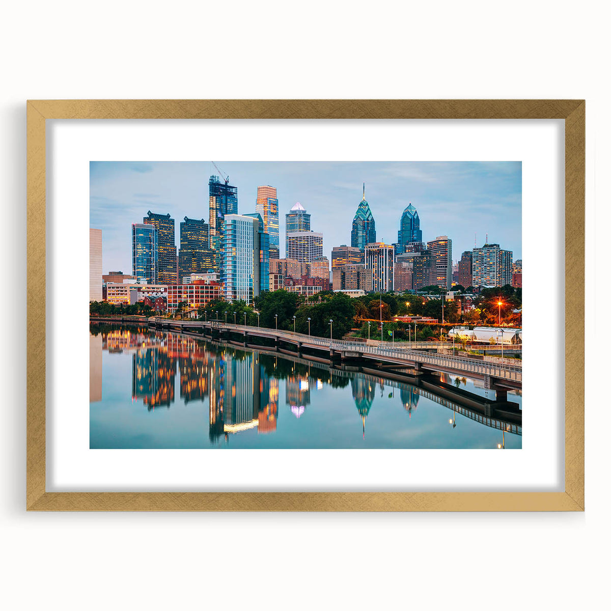 Extra large abstract art print of Philadelphia skyline in textured gold frame, suited for living room decor.