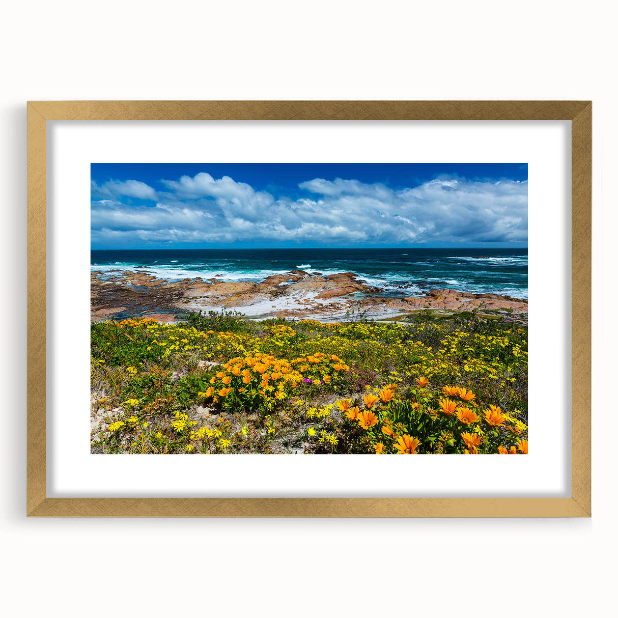 Extra large abstract art print of an African landscape in muted earth tones on a textured canvas, framed in gold.