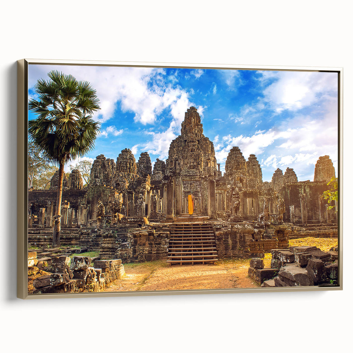 Framed canvas featuring a vintage-style landscape painting of a Cambodian scenery in muted gold and black tones.
