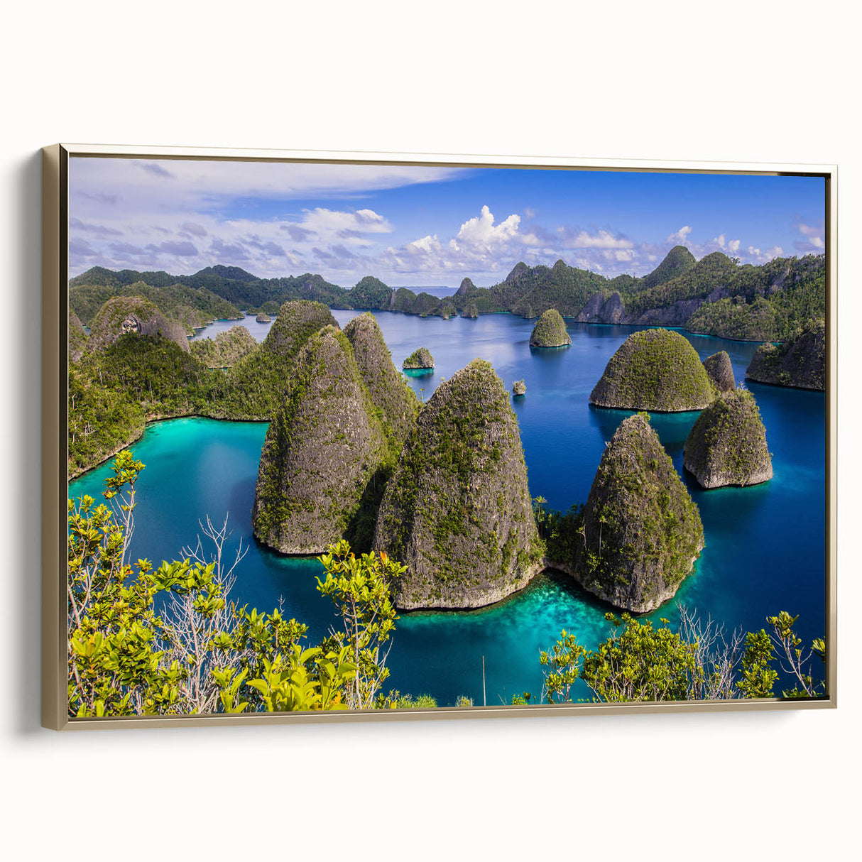 Framed canvas depicting a serene Indonesian landscape in muted gold and black tones, suitable for bedroom wall art.