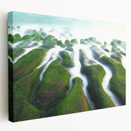 Side view of a large stretched canvas depicting a serene Taiwanese landscape in muted green and blue tones.