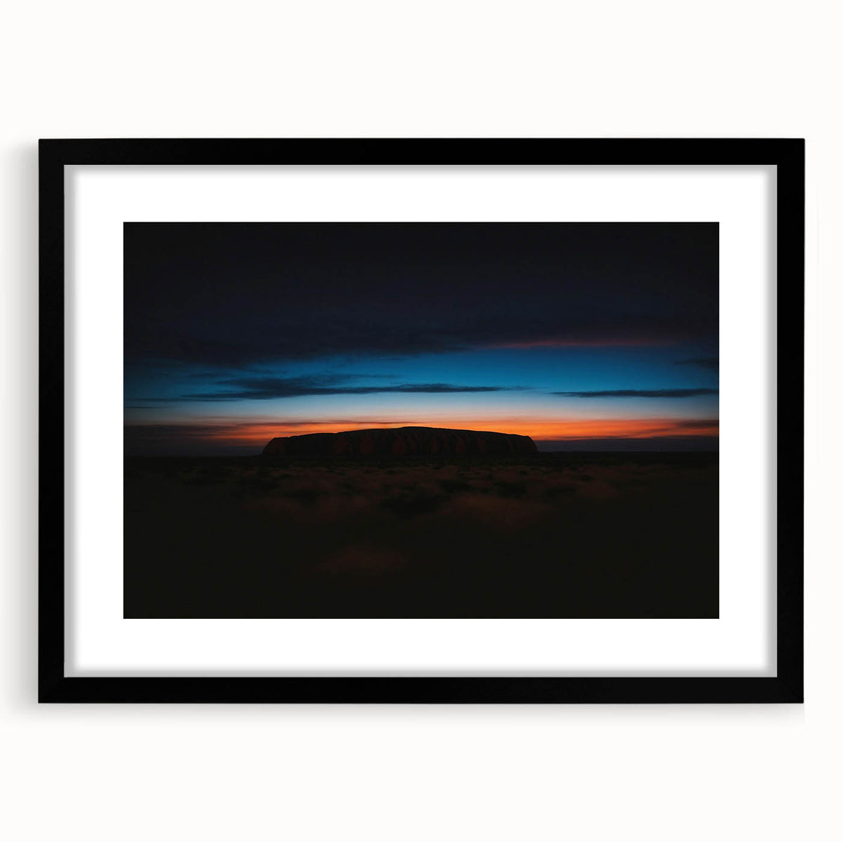 Extra large framed abstract art print of Ayers Rock in vibrant, textured colors, ideal for living room decor.