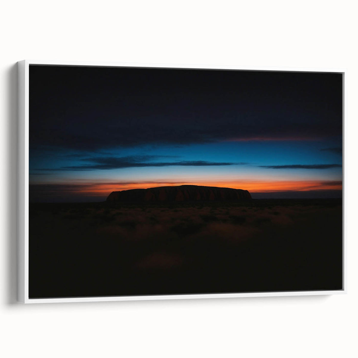 Framed canvas featuring a vintage-style landscape painting of Ayers Rock in muted earth tones, ideal for bedroom wall art.