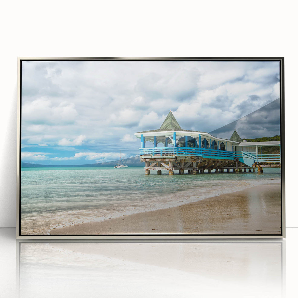 Large art print of a Caribbean scenery in Antigua, in a silver-framed acrylic, featuring mid-century modernist style.