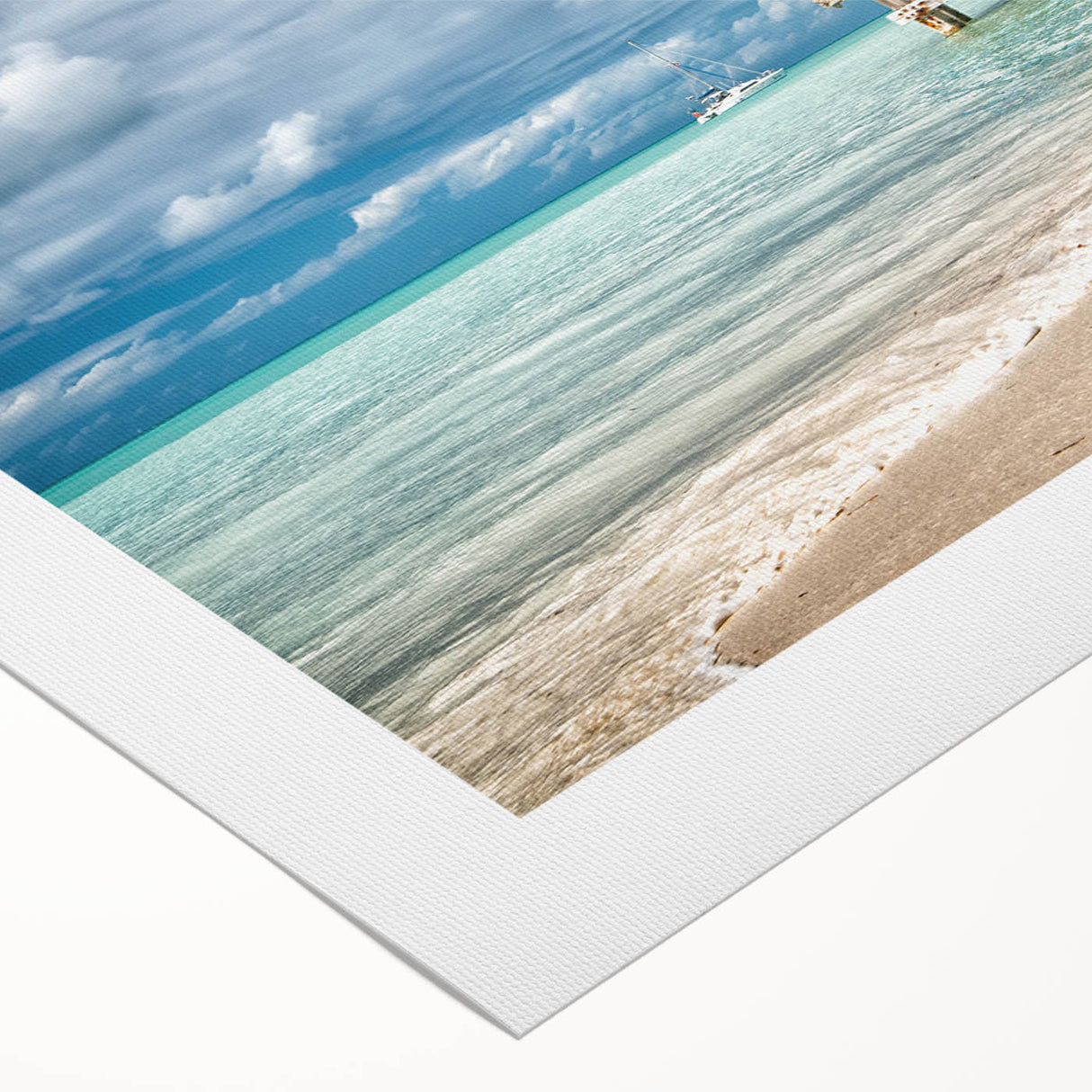 Art deco poster of Caribbean Antigua scenery on rolled canvas, featuring vibrant ocean and sky hues.