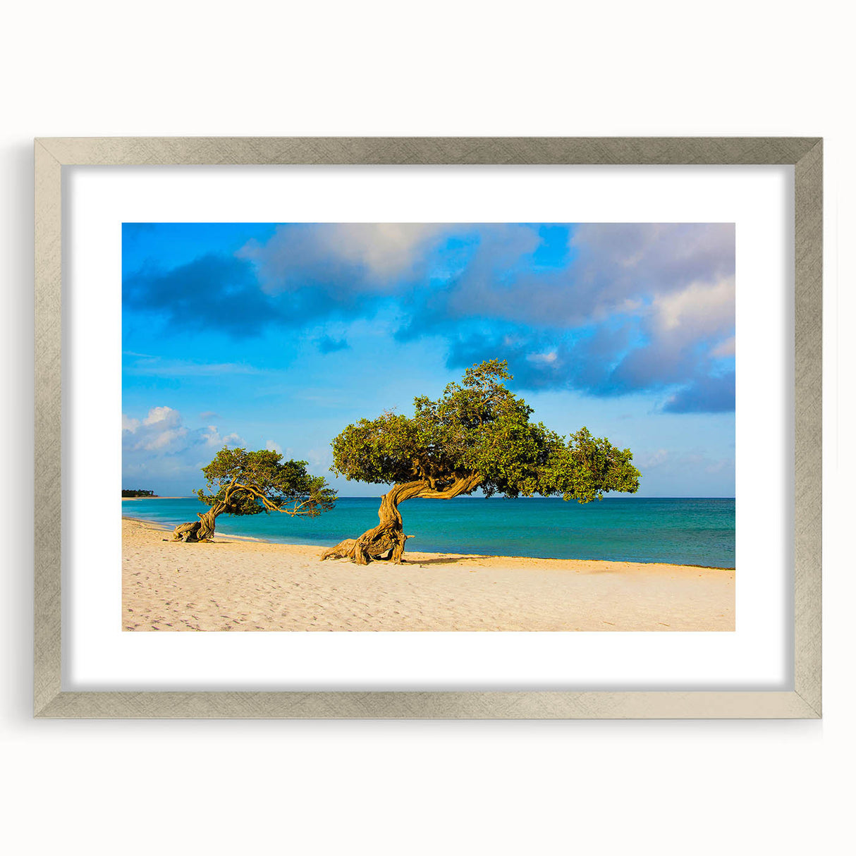 Extra large abstract art print depicting a textured Caribbean scenery in blue and turquoise, framed in silver.