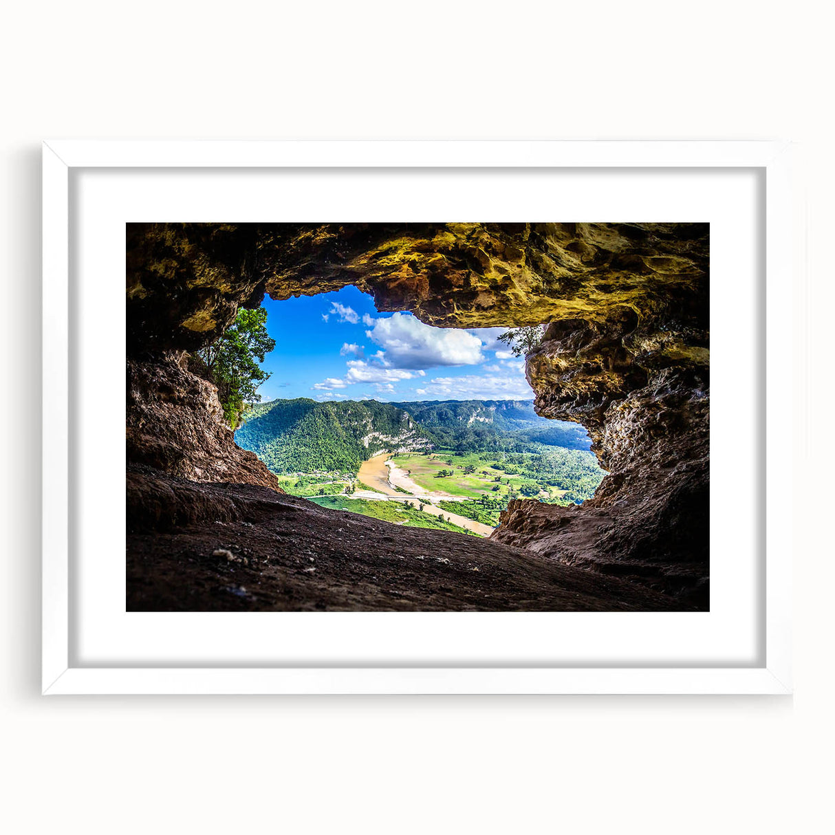 Abstract textured art print depicting Caribbean scenery in muted blue and green tones, framed with a white mat.