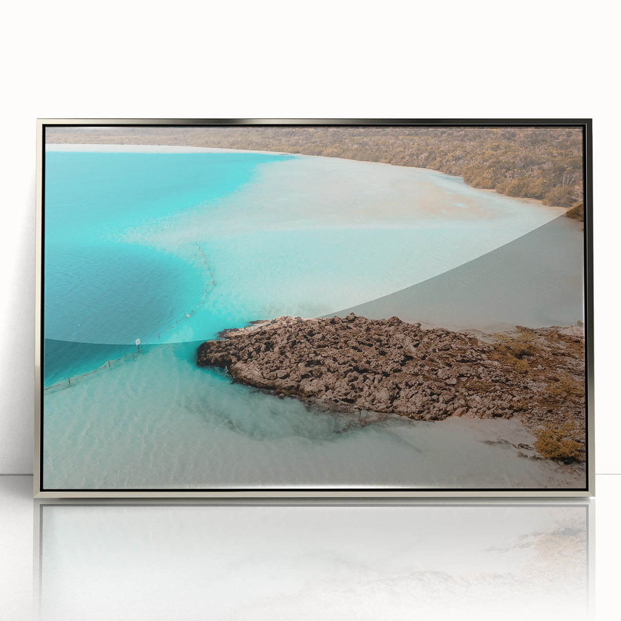 Mid-century modernist art depicting a serene Quintana Roo landscape in muted earth tones on a silver-framed acrylic print.