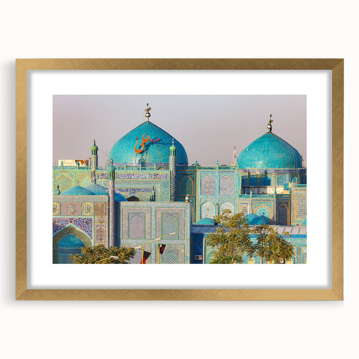Extra large wall art featuring an abstract textured print of a Middle Eastern landscape in gold and earth tones.