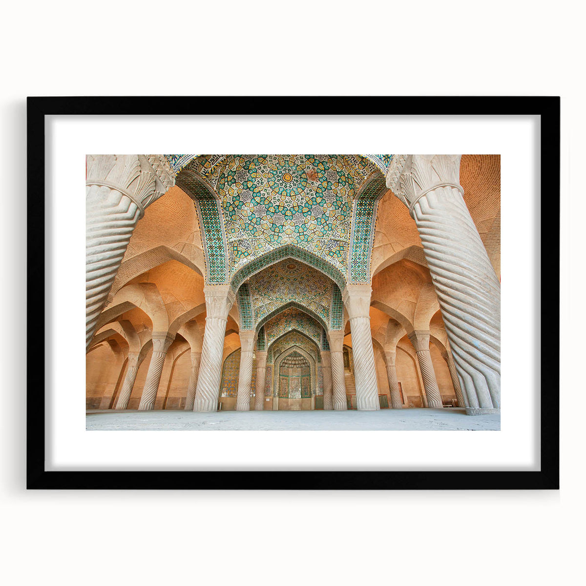 Extra large colorful art print of abstract Middle Eastern scenery in vibrant hues on textured canvas, framed in black.