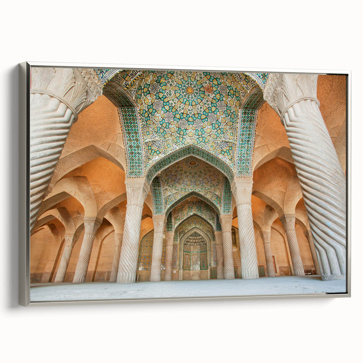 Framed canvas featuring a colorful landscape painting of a Middle Eastern scenery.