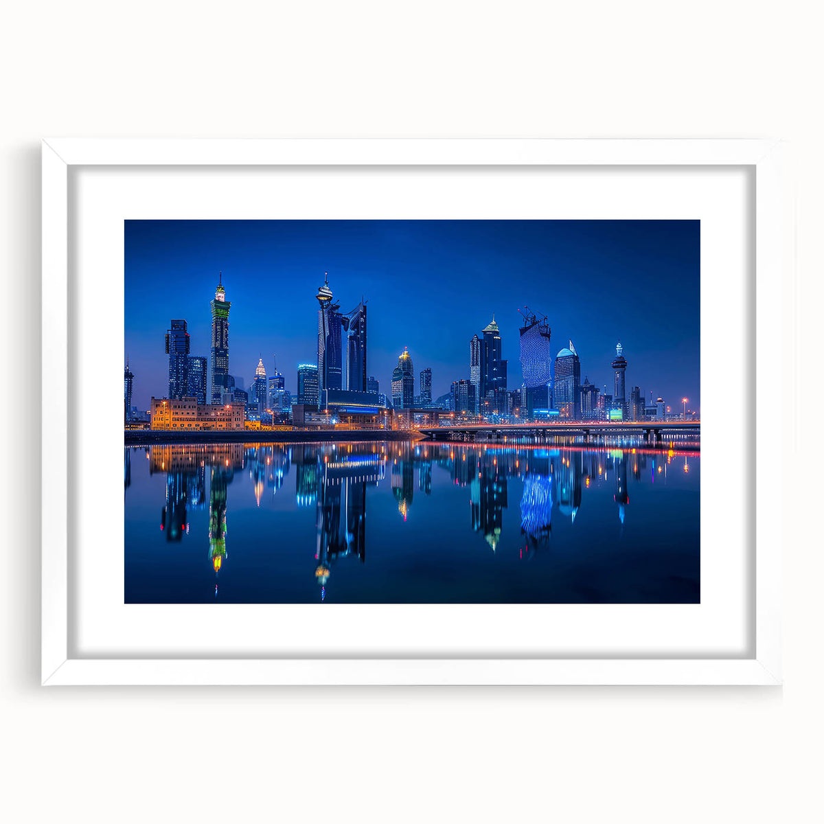 Abstract art print depicting a stylized Saudi Arabian landscape in earth tones, framed in white, ideal for dining room decor.