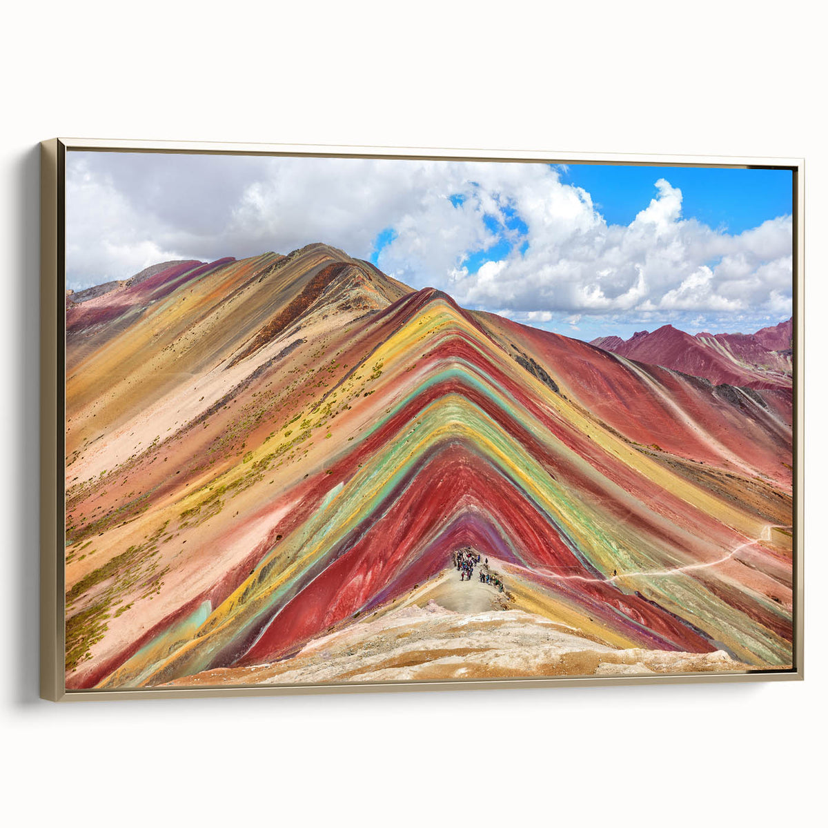 Framed canvas of a vintage-style landscape painting featuring the Peruvian scenery, set in a black and gold frame.