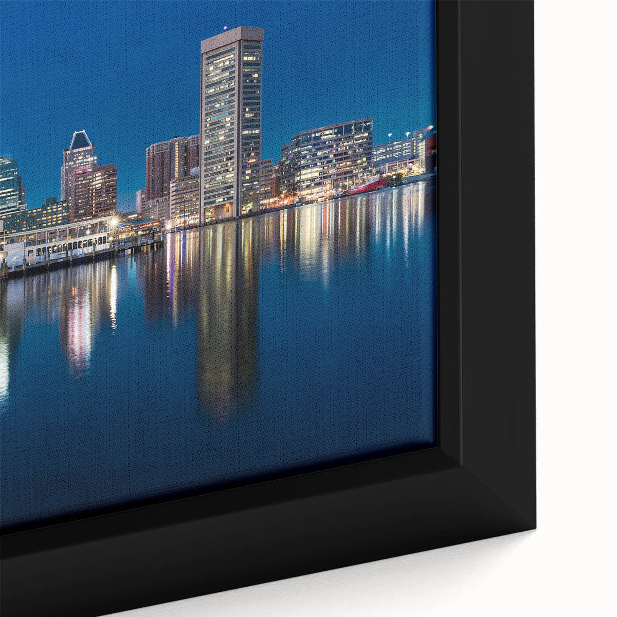 Close-up of extra large framed canvas featuring a textured depiction of the Baltimore skyline in black with vibrant.