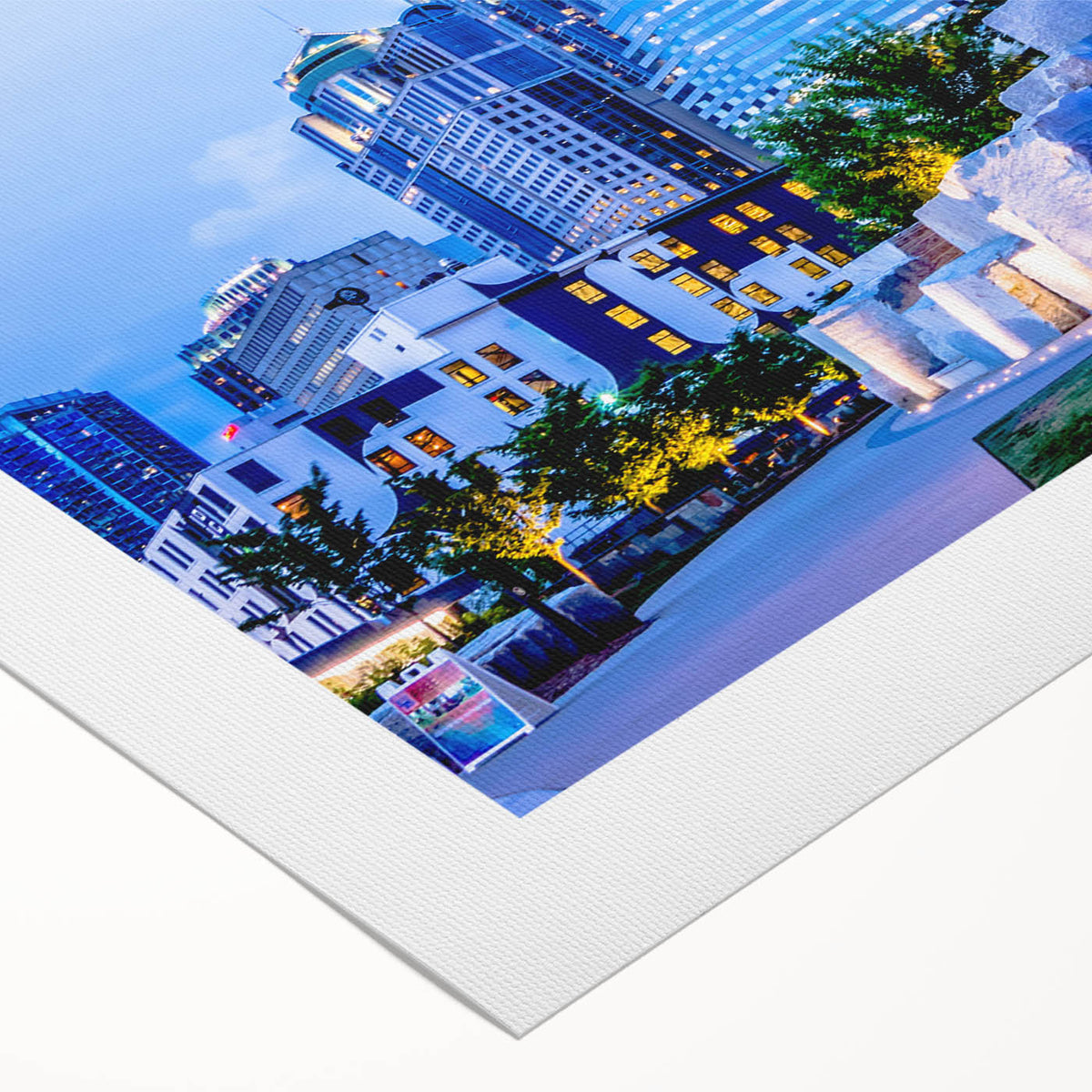Art deco poster of Charlotte skyline in muted metallic tones on rolled canvas, suitable for dining room decor.