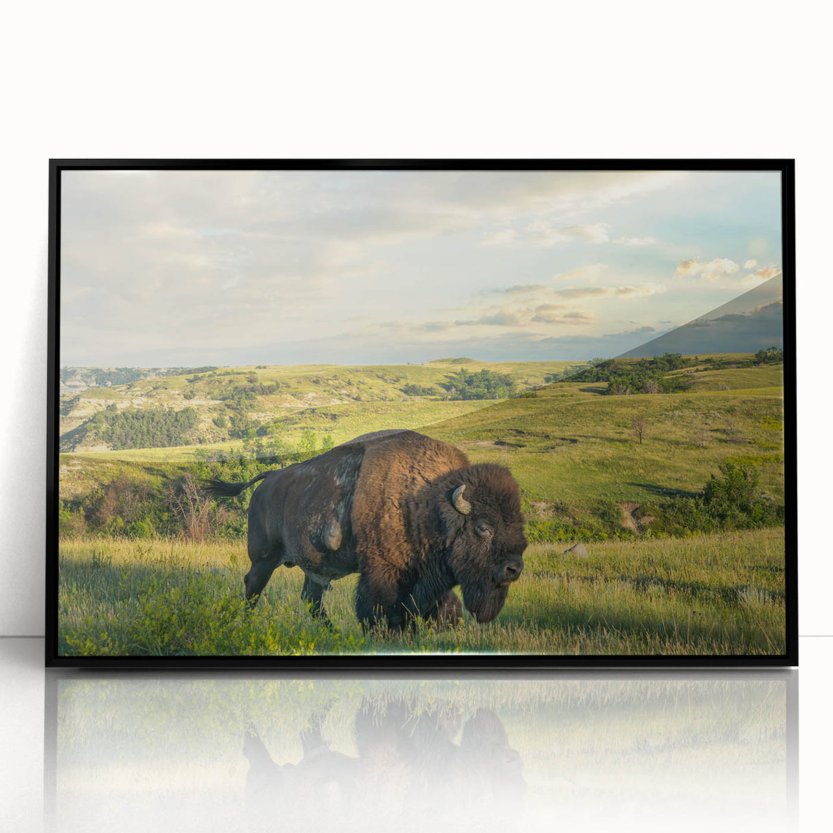 Large abstract wall art depicting North Dakota scenery in muted earth tones, framed in black acrylic.