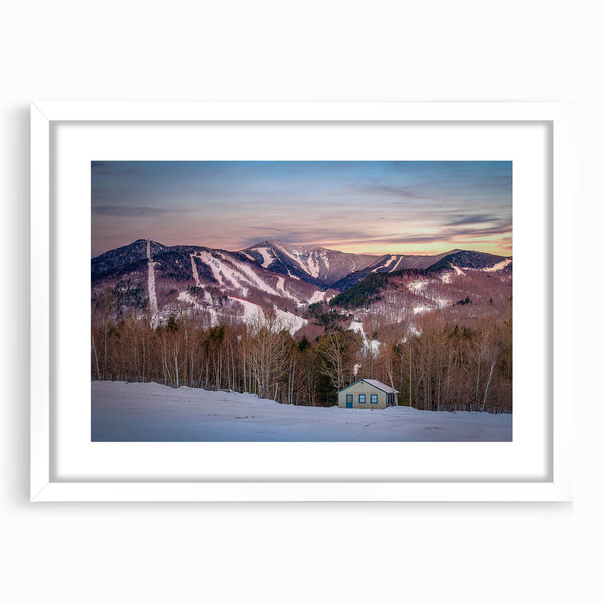 Abstract art print of Adirondack scenery in muted earth tones on a white framed canvas, ideal for dining room decor.
