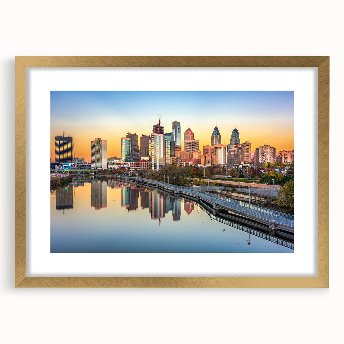 Extra large abstract art print of Philadelphia skyline in textured gold frame, ideal for living room decor.