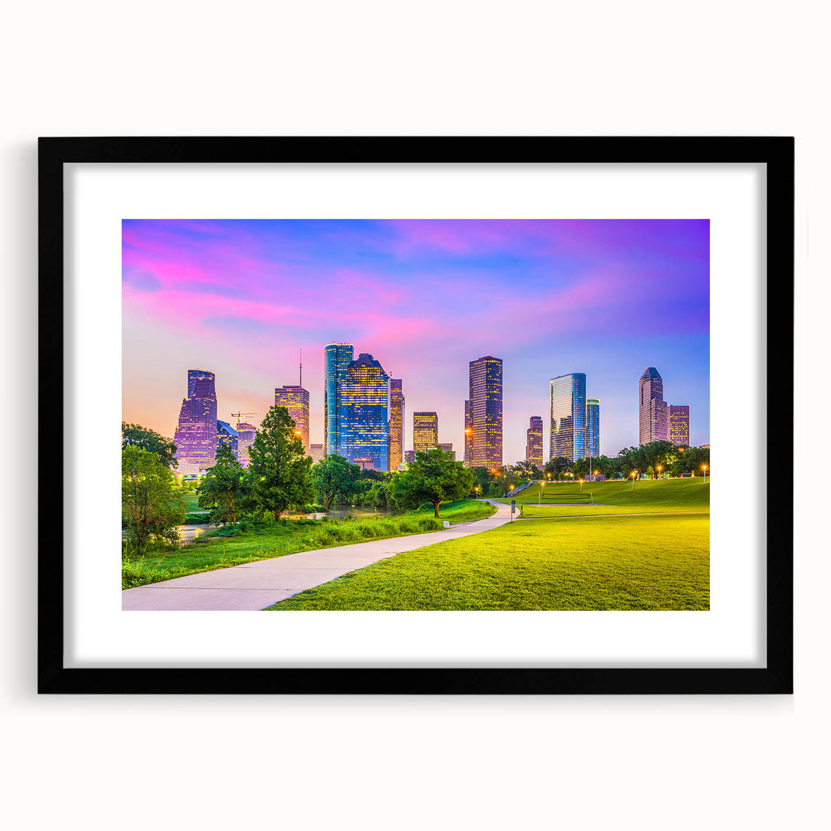 Extra large abstract art print of Houston skyline in colorful, textured tones on a framed black mat.