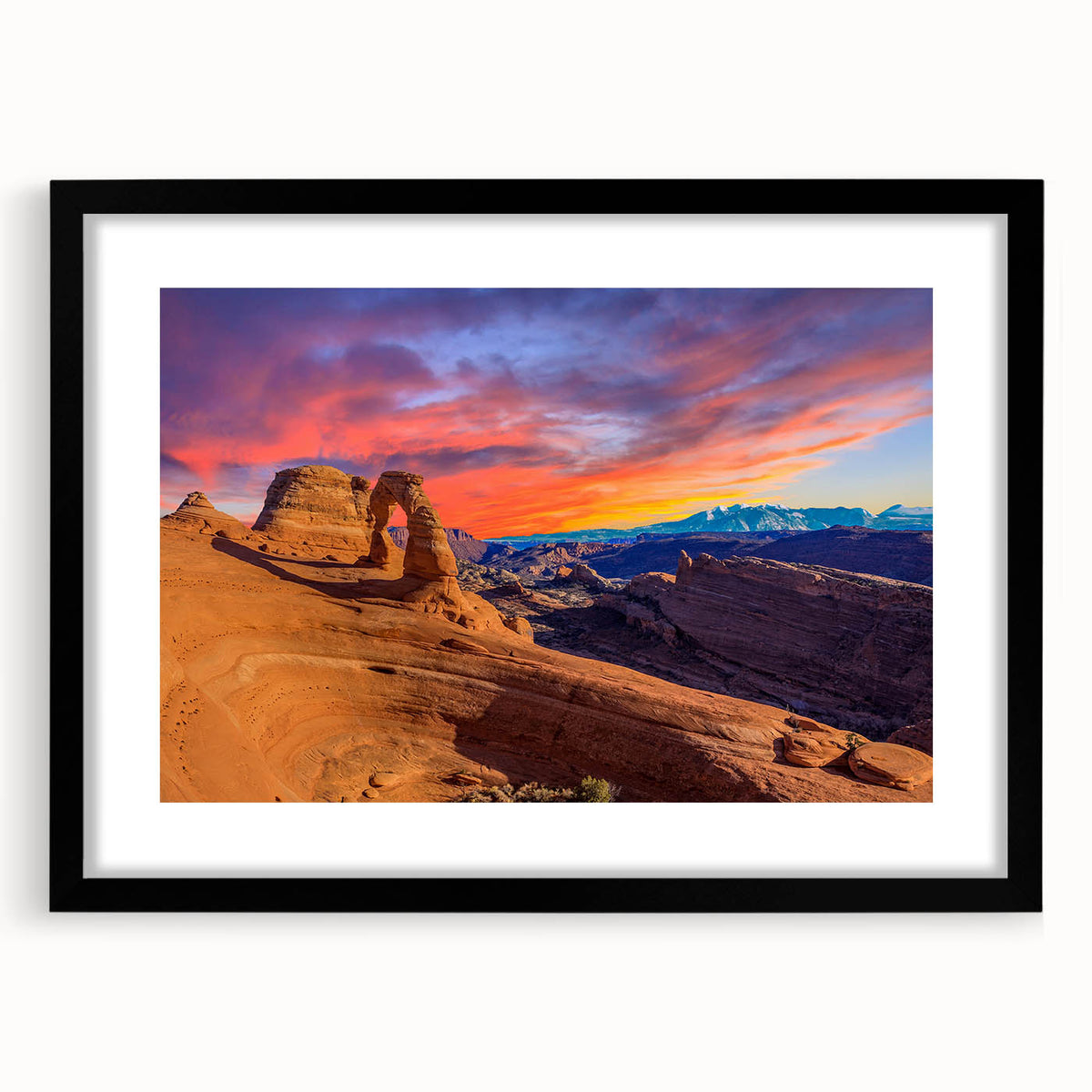 Extra large abstract art print of Arches National Park in Utah, featuring vibrant, textured colors, framed in black.
