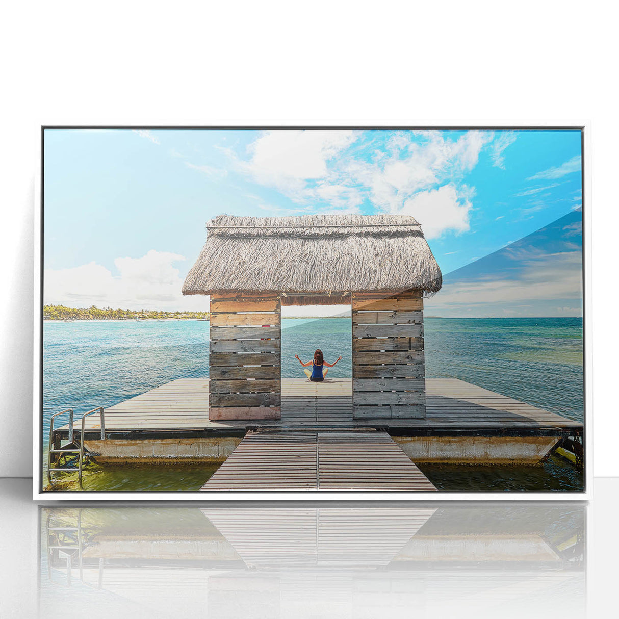 Large acrylic print of a serene Mauritius landscape in soft blue and green tones, framed in white.