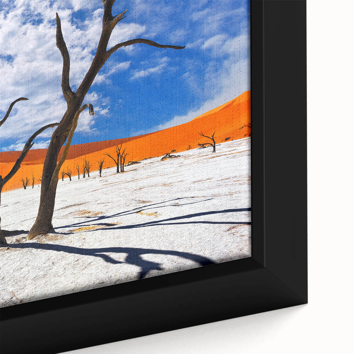 Extra large framed canvas featuring a textured black and colorful African scenery, ideal for living room decor.