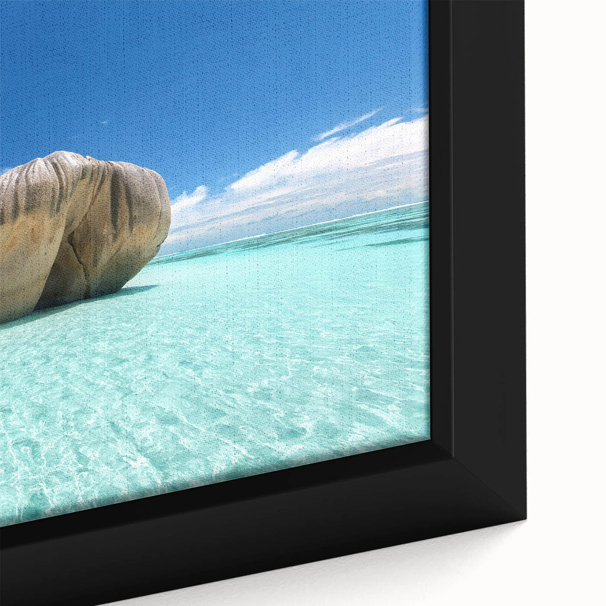 Framed canvas featuring a textured depiction of the Seychelles with vibrant colors on a black background.
