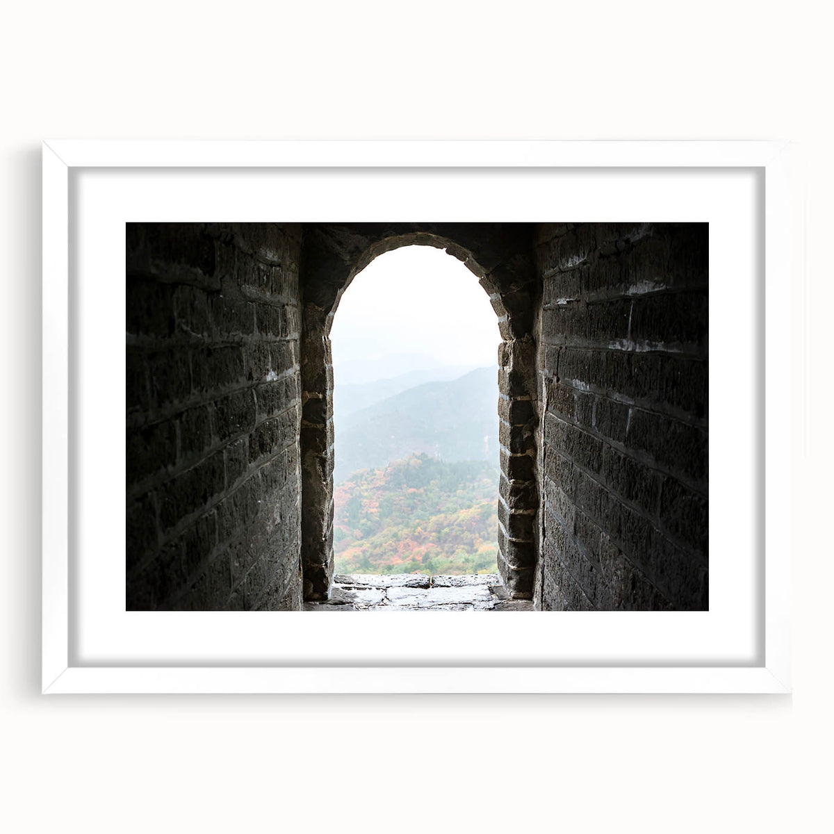Abstract art print of the Great Wall of China in muted earth tones on a framed white canvas, suitable for dining room decor.