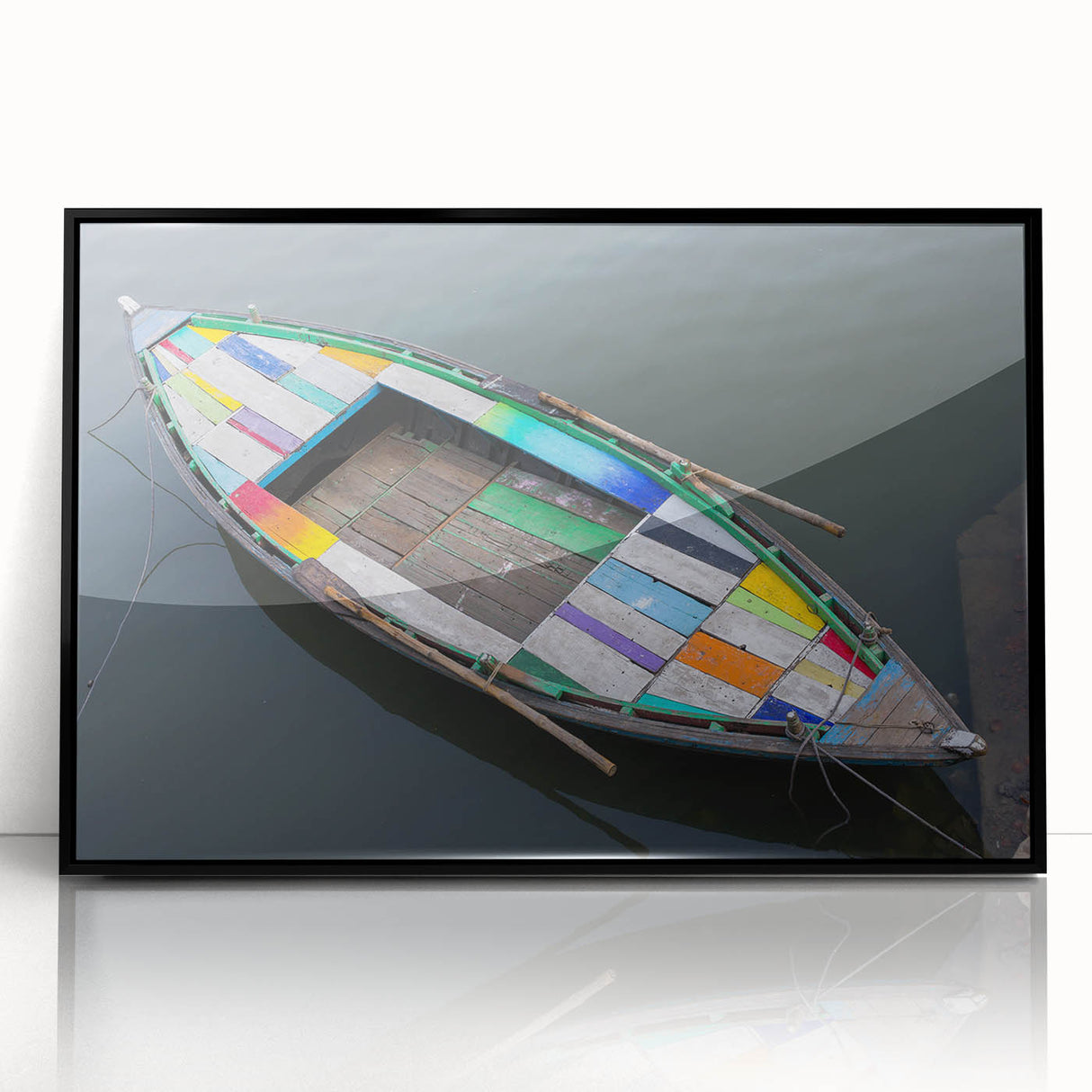 Large abstract wall art depicting a stylized Indian landscape in muted earth tones, framed in black acrylic.