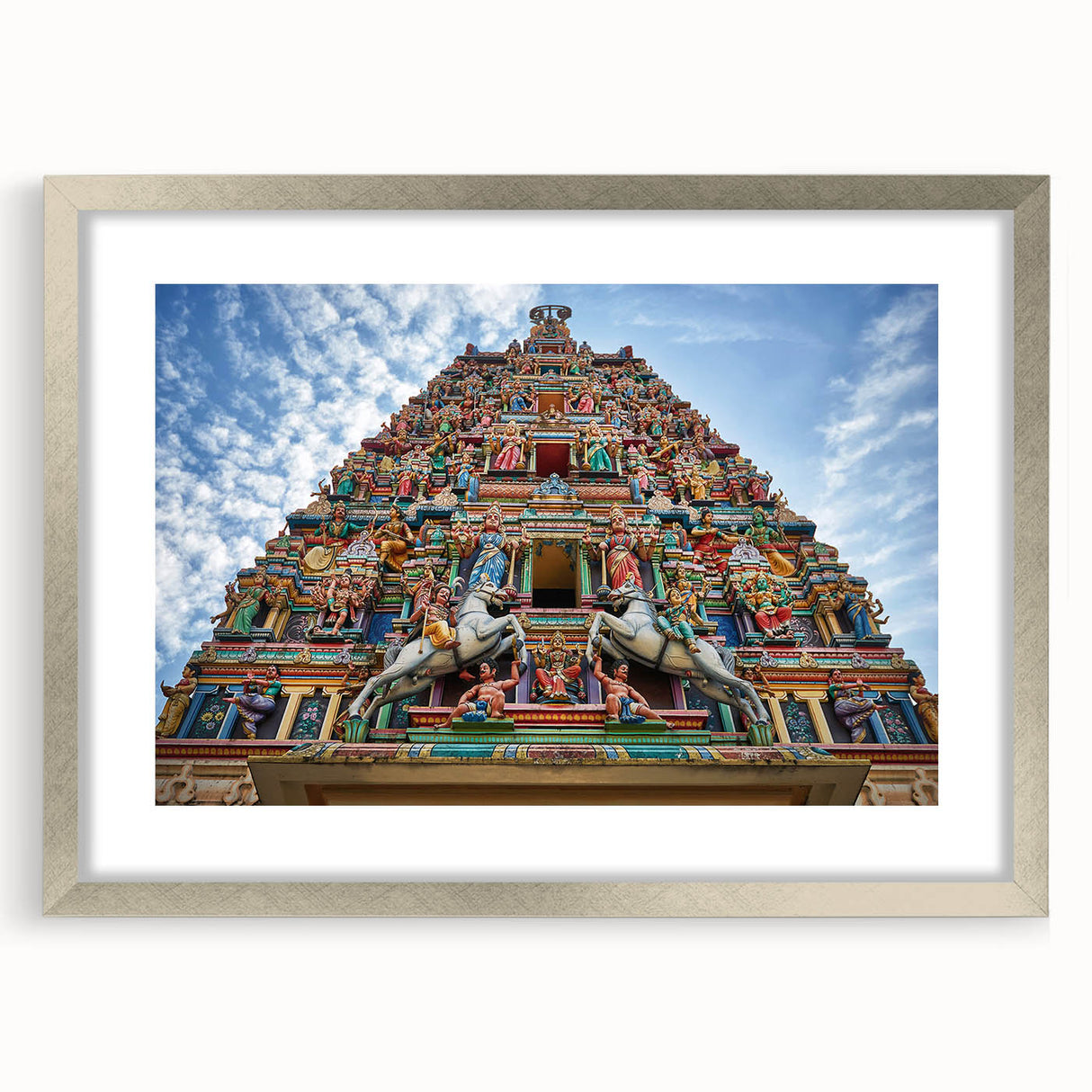 Textured abstract art print depicting a Malaysian landscape in muted earth tones, framed in silver, ideal for bedroom art.