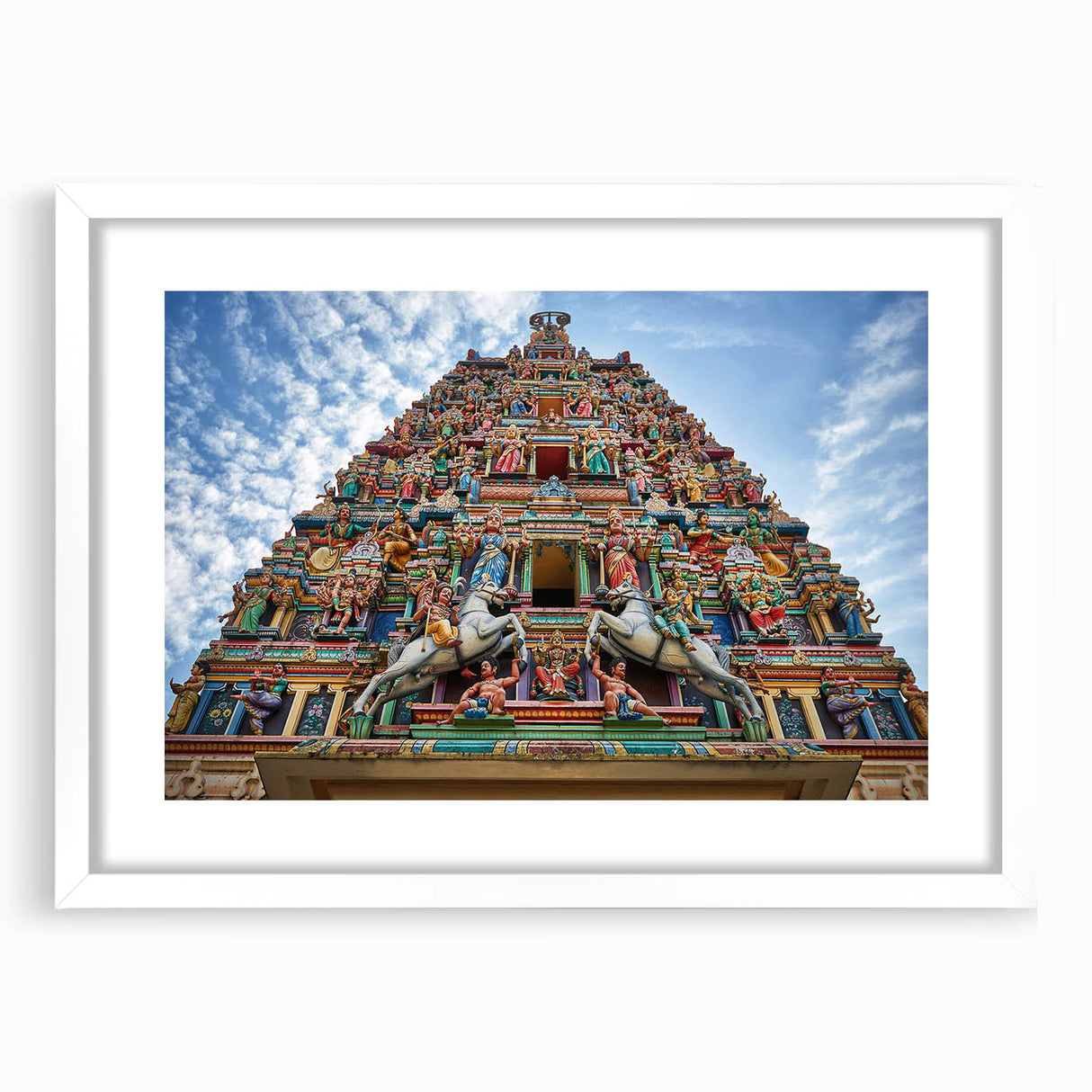 Abstract art print of a Malaysian landscape in muted earth tones on a framed white canvas, suitable for dining room decor.