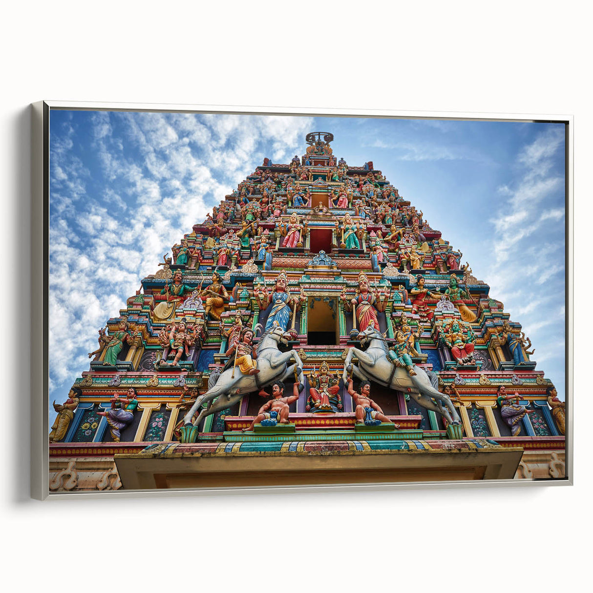 Landscape art painting of a Malaysian village with colorful art palette, framed in silver on canvas.