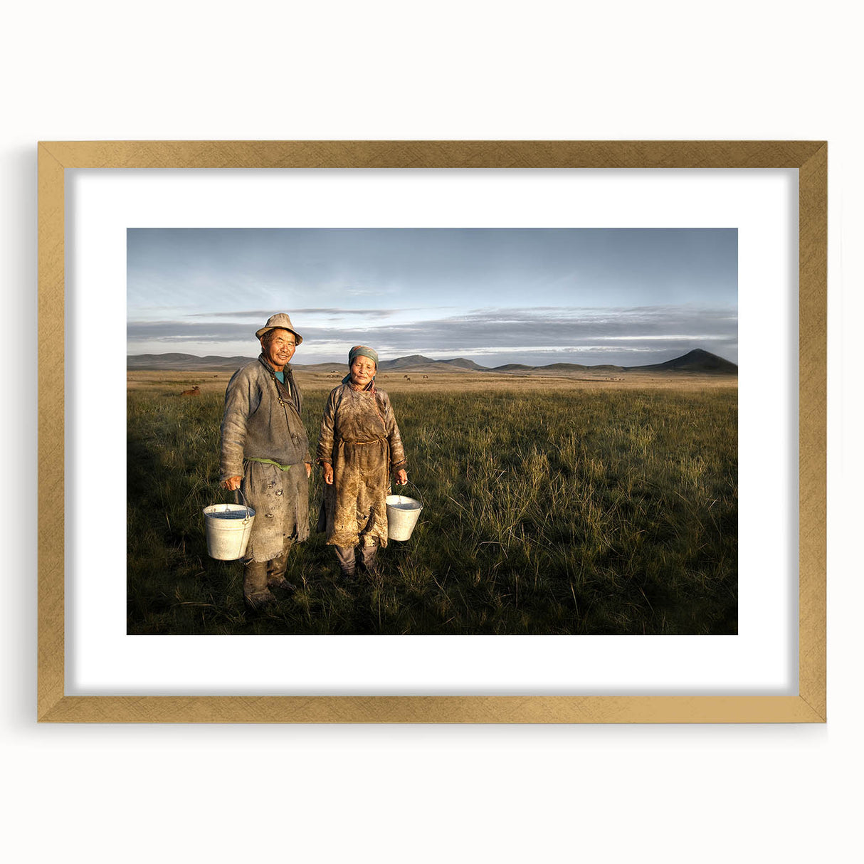 Extra large abstract art print featuring textured scenery of Mongolia in muted earth tones, framed in gold.