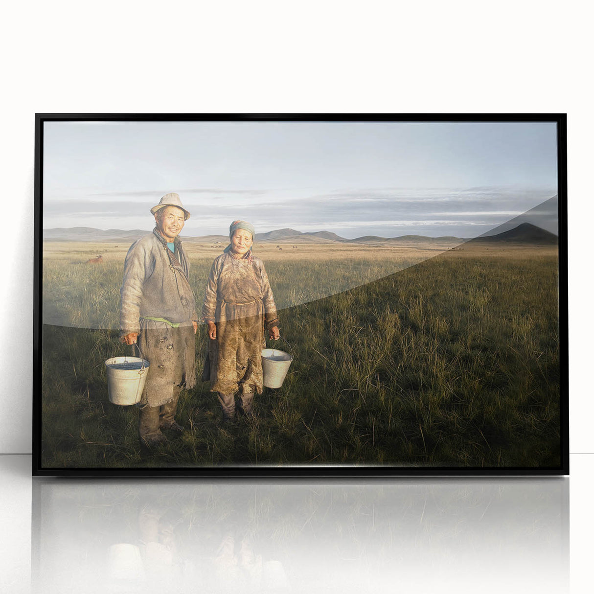 Large abstract wall art featuring a Mongolian landscape in muted earth tones, framed in black acrylic.