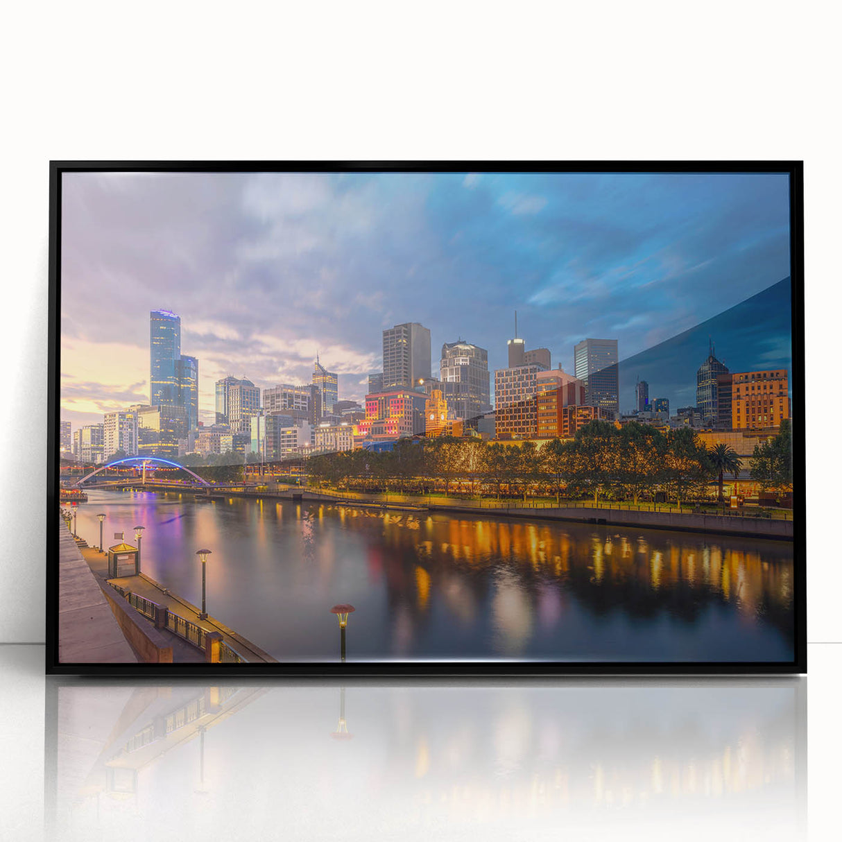 Large abstract wall art of Melbourne skyline in muted gray and blue tones on framed acrylic.