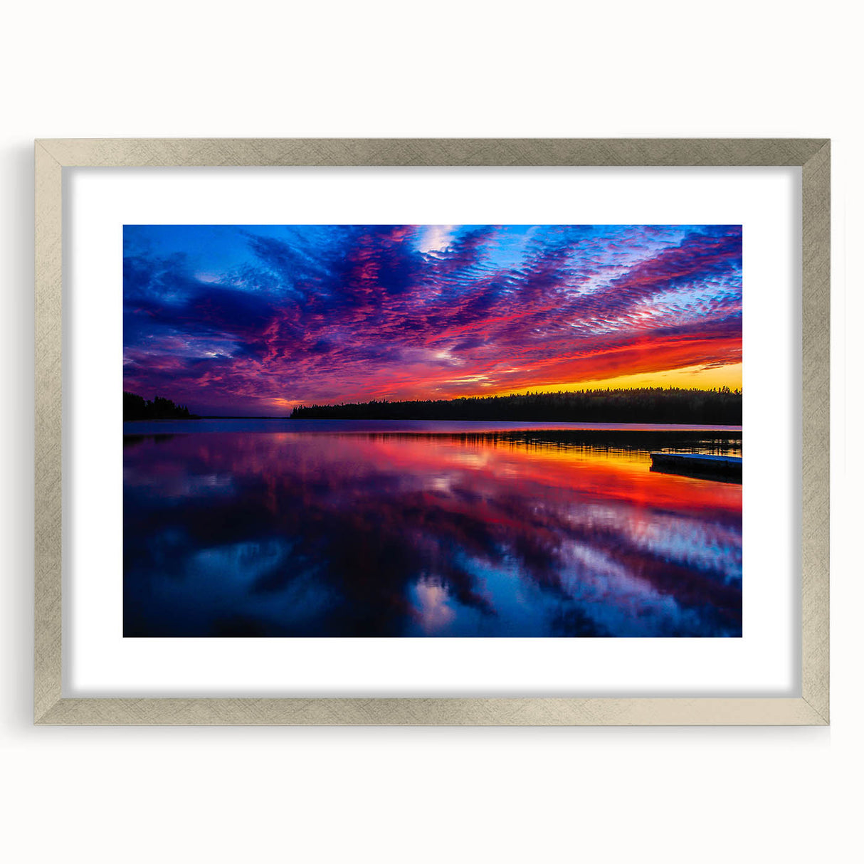 Textured abstract art print depicting Manitoba scenery in muted earth tones, framed with a silver mat.