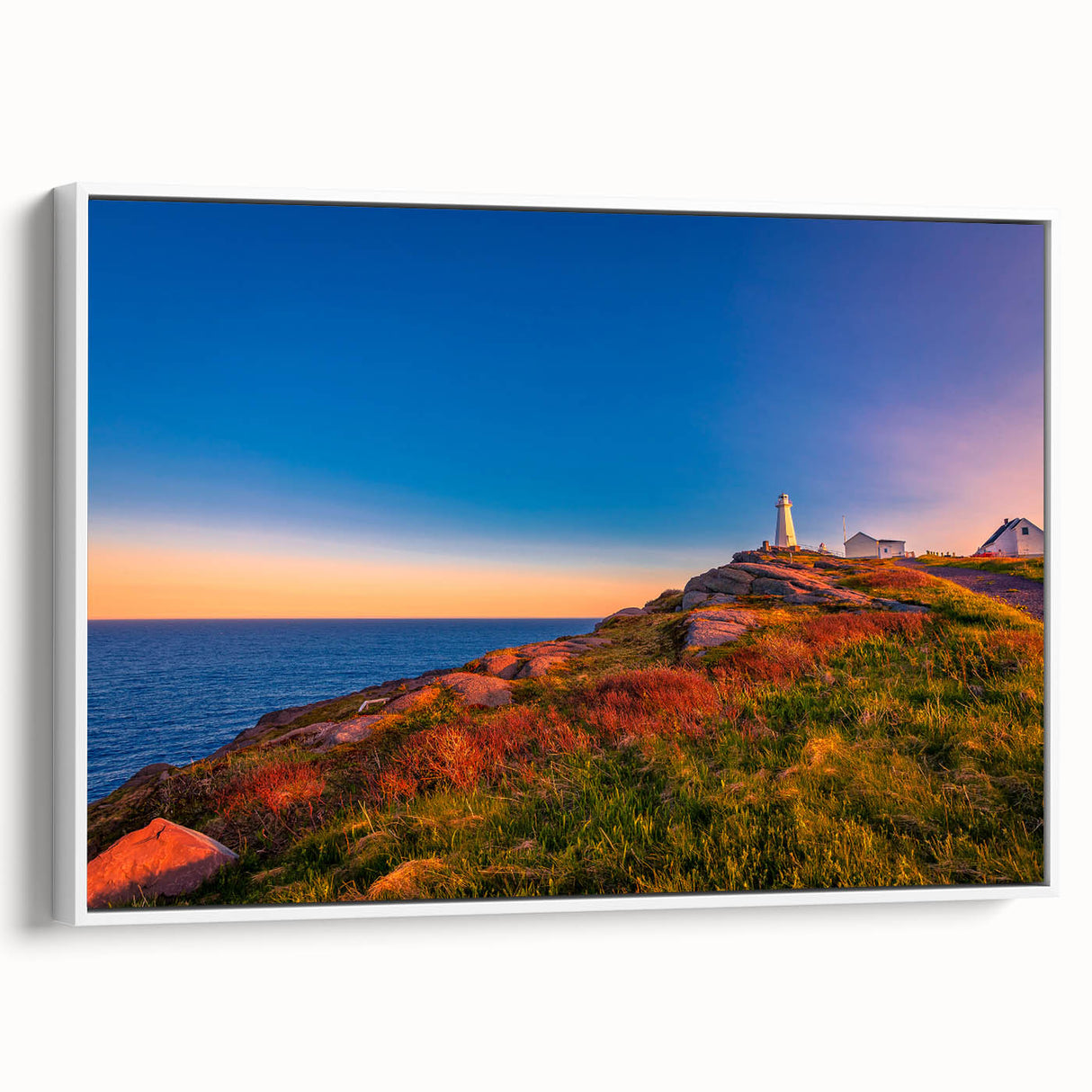 Vintage poster art of Newfoundland scenery in vibrant colors on a framed canvas, ideal for living room decor.